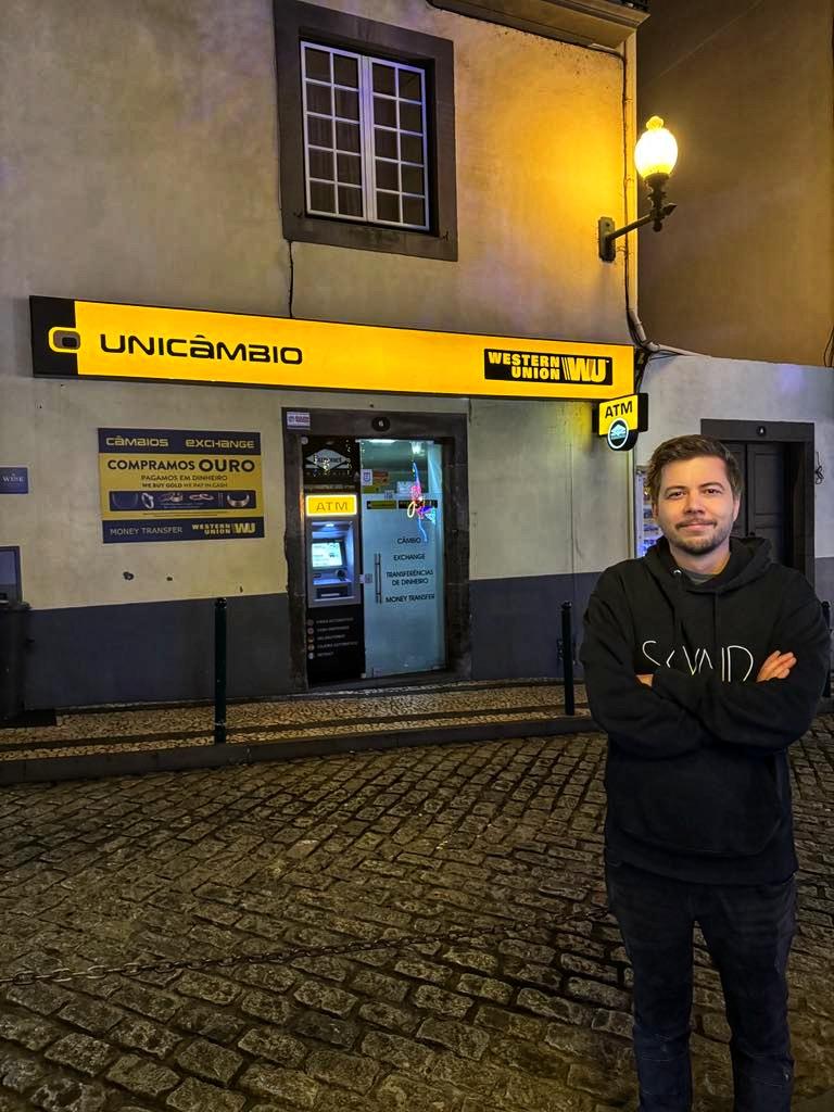 Kris at a Western Union location from Oscar's video in Madeira